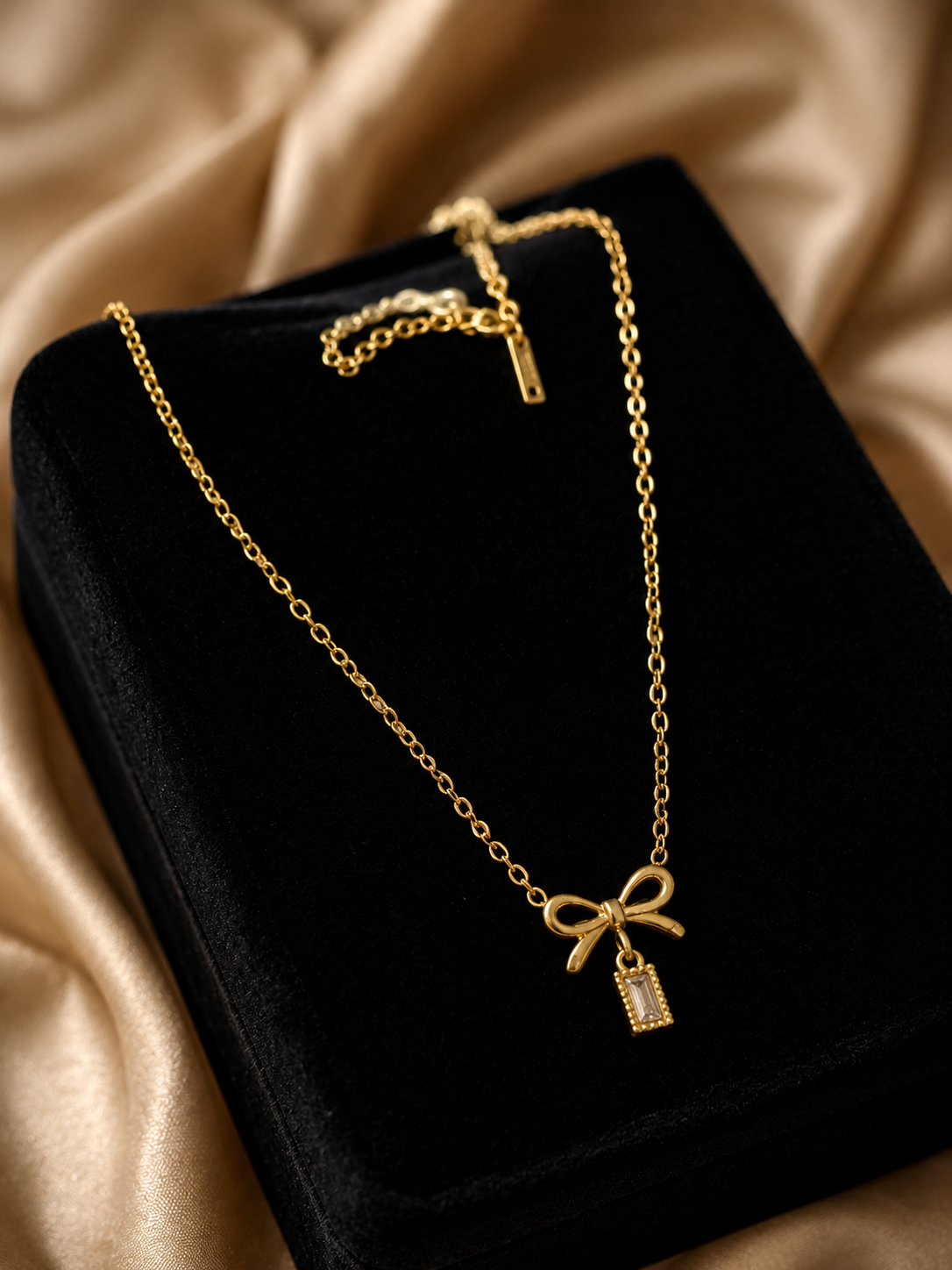 The Serene Bow Baguette Pendant