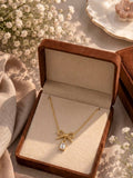 The Regal Ribbon Éclat: Royal Empress 24K Gold-Plated Heirloom Pendant