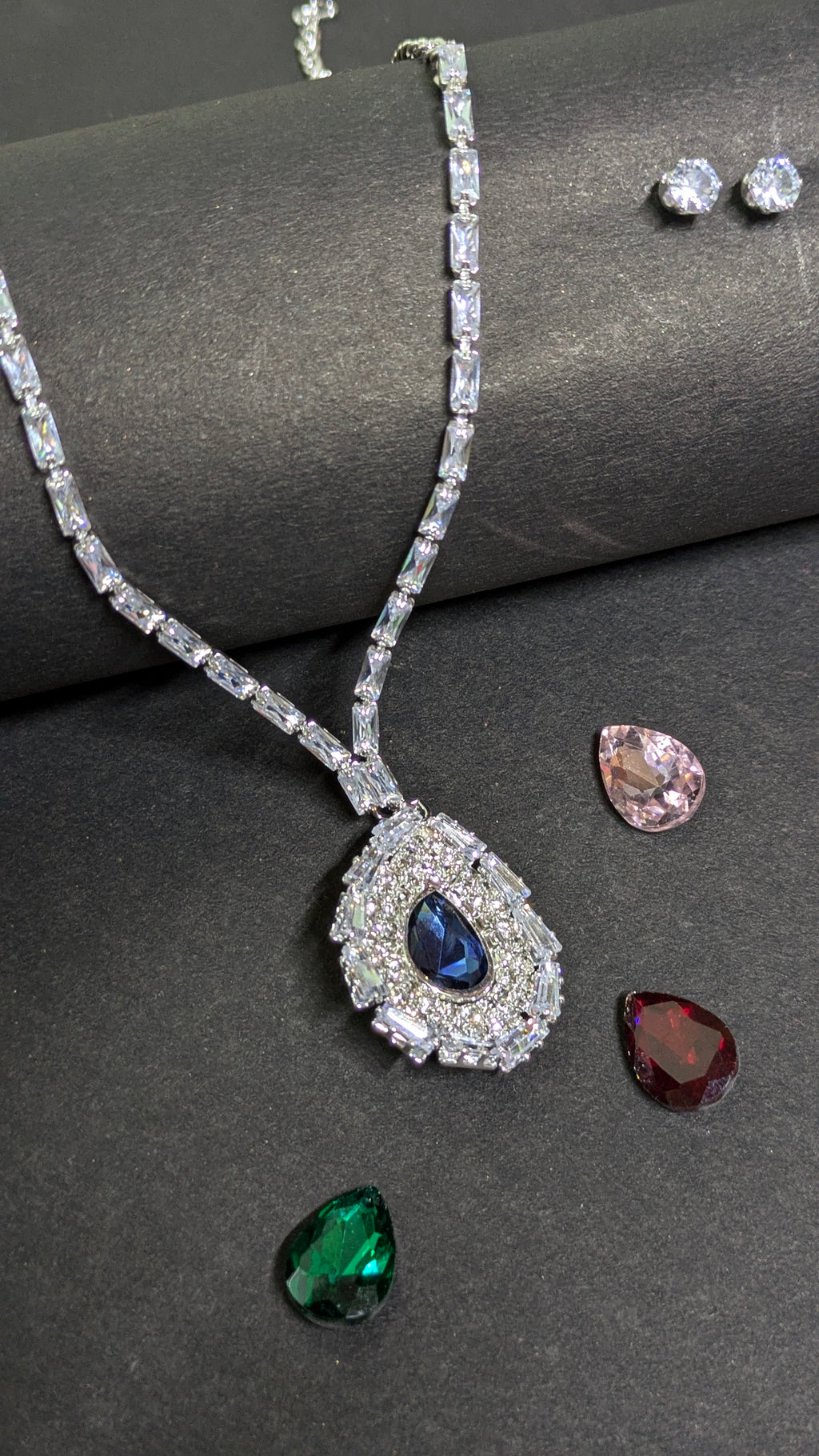Elegance In Motion: 4-in-1 Interchangeable Crystal Halo Pendant Set with Baguette Chain & Matching Studs